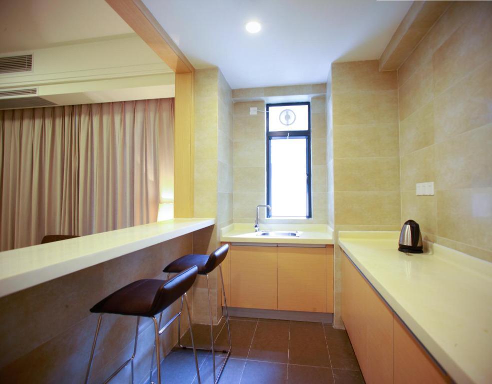 Xcellent International Serviced Apartment Kanton Zimmer foto